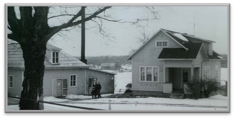 Plum Hollow Cheese Factory on the left and the home of the legendary Claude Flood (cheesemaker) at the right of the factory. Note an old barn in the background. Plum Hollow Cheese Factory