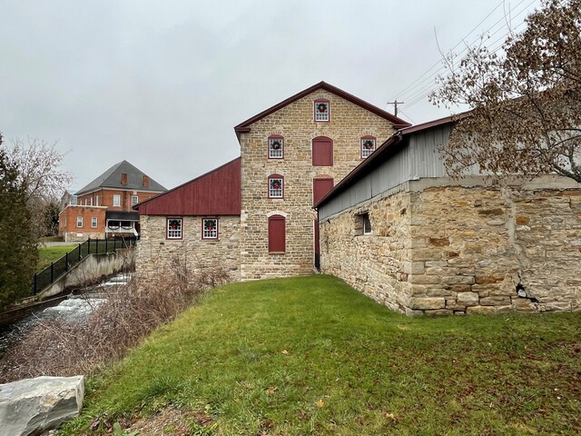 Mill Historic Site Old Stone Mill Exterior with Old Town Hall Christmas Wreaths Delta November 2021 Full Permissions Marie White