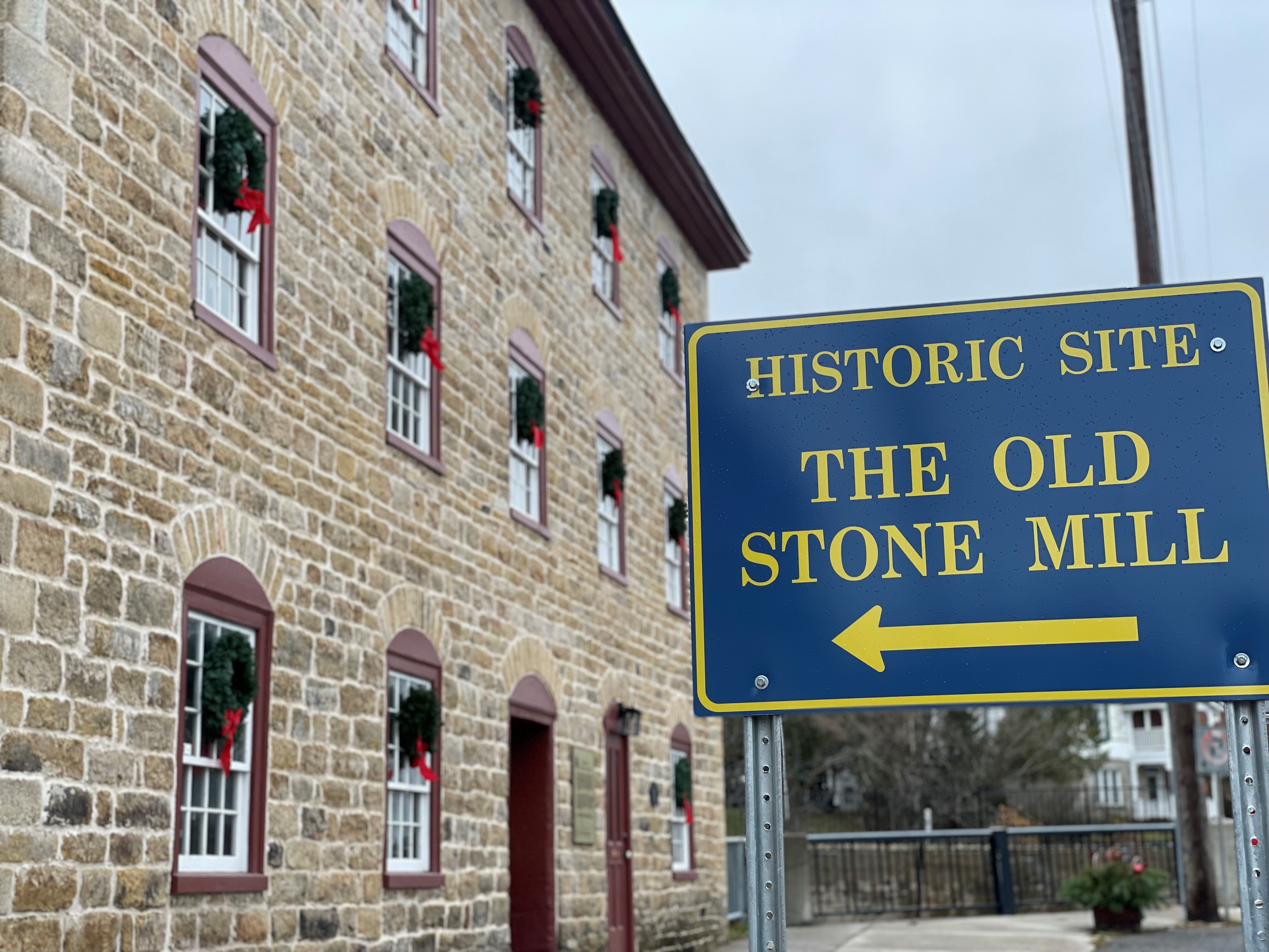 Mill Historic Site Old Stone Mill Sign with arrow Exterior Delta November 2021 Full Permissions Marie White