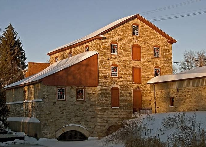 old stone mill in winter by Ken Watson 